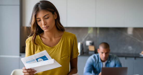 Woman reviewing her SDGE bill