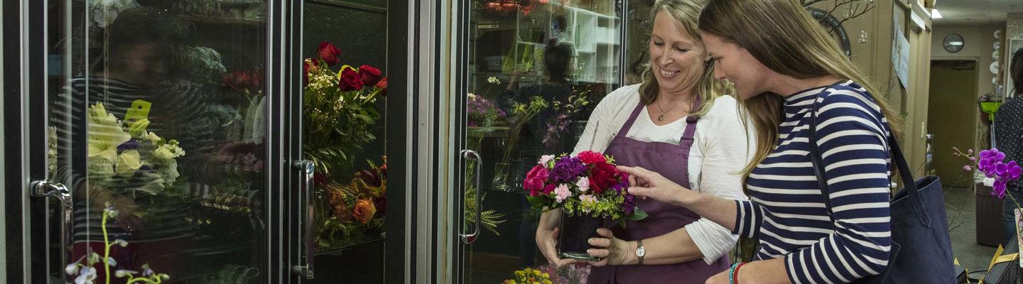 Florist interacting with a customer