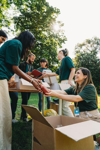 Volunteers helping people with food